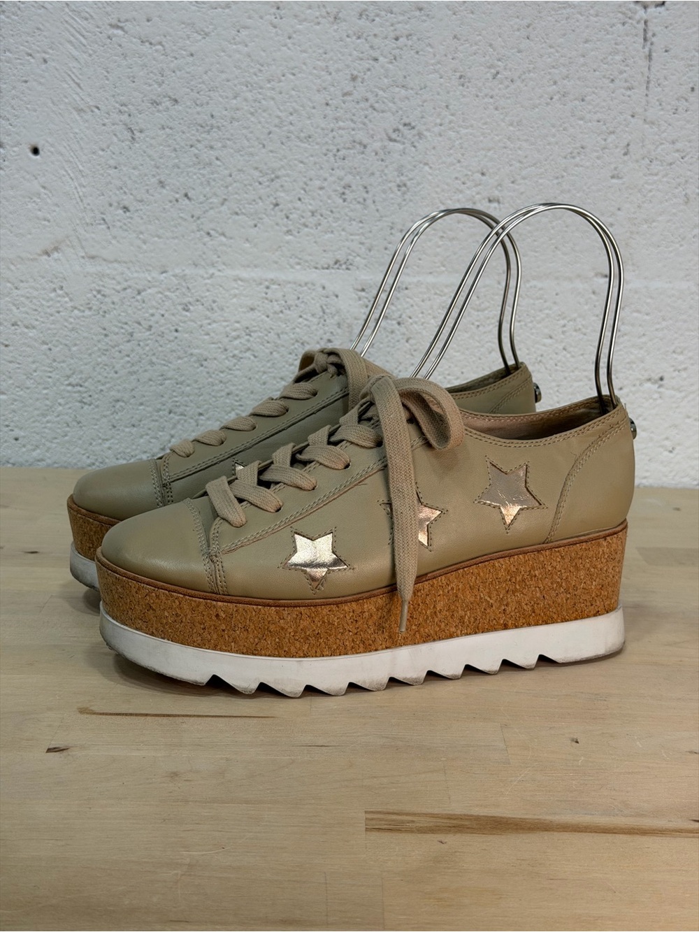 Steve Madden Beige Platform Sneakers with Metallic Star Accents